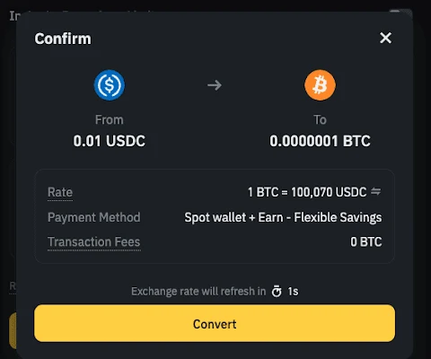 币安帮助中心提供的 Convert 确认页示例：显示付款数量、预计收到的 BTC、兑换率及 Transaction Fees 0 BTC